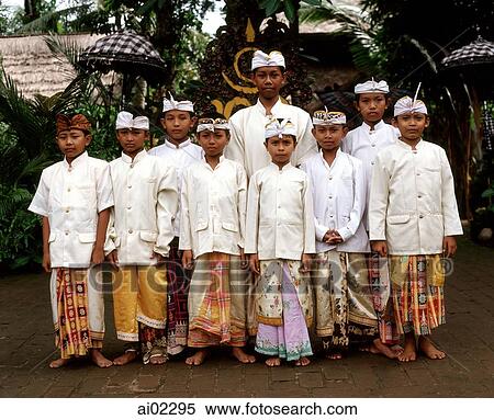Indonesia, Bali, young boys in traditional costume View Large Photo Image Stock Photography - Indonesia, Bali, young boys in traditional costume. Fotosearch