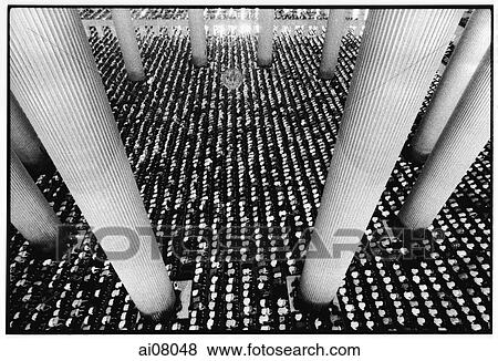 Stock Photo - Indonesia, Jakarta, Friday prayers at Istiqlal mosque. (artistic grain). Fotosearch