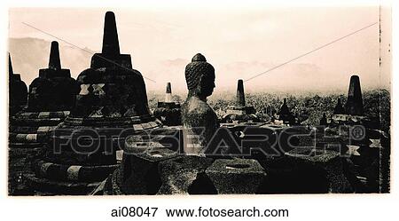 Stock Photo - Indonesia, Java, Magelang, Stupas on Candi Borobudur. (artistic grain). Fotosearch