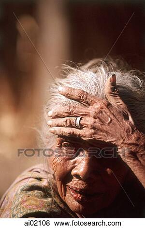 Indonesia, Lombok, a Sasak Muslim woman (close-up). View Large Photo Image Stock Photo - Indonesia, Lombok, a Sasak Muslim woman (close-up).. Fotosearch