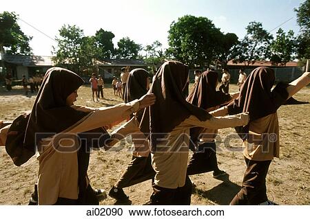 Indonesia, Lombok, Muslim girls marching in school. View Large Photo Image Stock Image - Indonesia, Lombok, Muslim girls marching in school.. Fotosearch