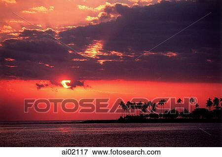 Stock Photo - Indonesia, Lombok, sunset over Bali Strait.. Fotosearch