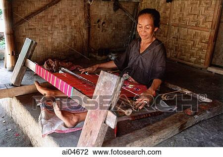 Indonesia, Lombok, woman weaving View Large Photo Image Stock Image - Indonesia, Lombok, woman weaving. Fotosearch
