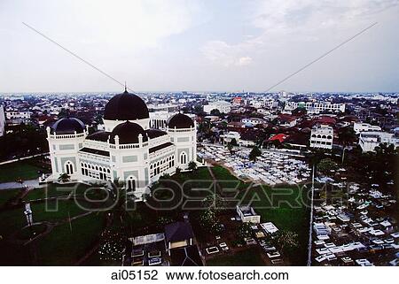 Indonesia, Sumatra, Medan, Great Mosque and surrounding city. View Large Photo Image Stock Image - Indonesia, Sumatra, Medan, Great Mosque and surrounding city.. Fotosearch