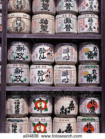 Stock Photograph - Japan, Casks of sake at temples, donated by companies. Fotosearch