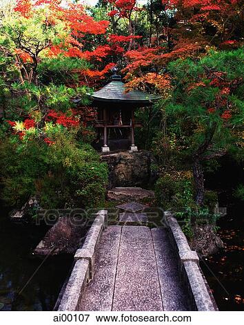 Japan, Kyoto, small stone bridge leading to domestic shrine View Large Photo Image Stock Photo - Japan, Kyoto, small stone bridge leading to domestic shrine. Fotosearch