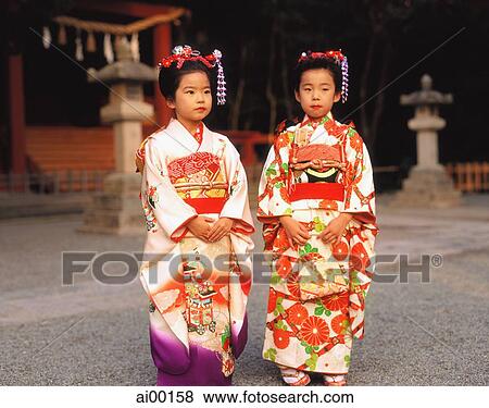 Japan, Shichi-Go-San Festival, two girls wearing kimonos View Large Photo Image Stock Photo - Japan, Shichi-Go-San Festival, two girls wearing kimonos. Fotosearch