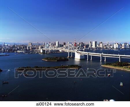 Japan, Tokyo, Rainbow Bridge with city of Tokyo behind View Large Photo Image Picture - Japan, Tokyo, Rainbow Bridge with city of Tokyo behind. Fotosearch