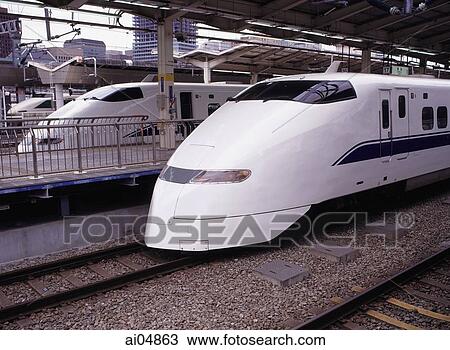 Stock Image - Japan, Tokyo, Shinkansen (bullet train) at Tokyo Station. Fotosearch