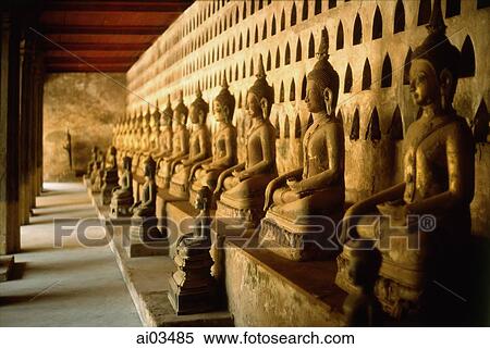 Laos, Vientiane, A row of stone Buddha statues in a hall of Wat Si Saket View Large Photo Image Stock Photography - Laos, Vientiane, A row of stone Buddha statues in a hall of Wat Si Saket. Fotosearch