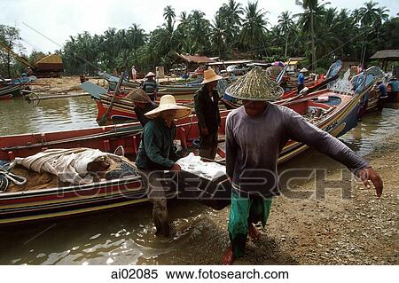 Malaysia, Kota Bahru, fisherman at shore. View Large Photo Image Stock Photography - Malaysia, Kota Bahru, fisherman at shore.. Fotosearch