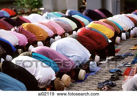 Malaysia, Kota Bahru, Muslim men praying at Kubang Kerian Mosque. View Large Photo Image Stock Photo - Malaysia, Kota Bahru, Muslim men praying at Kubang Kerian Mosque.. Fotosearch
