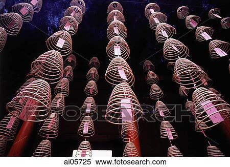 Malaysia, Kuala Lumpur, Chinatown, Burning incense coils hanging from ceiling. View Large Photo Image Stock Photography - Malaysia, Kuala Lumpur, Chinatown, Burning incense coils hanging from ceiling.. Fotosearch