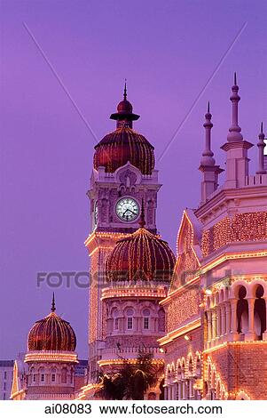 Malaysia, Kuala Lumpur, Clock Tower at night. View Large Photo Image Stock Image - Malaysia, Kuala Lumpur, Clock Tower at night.. Fotosearch