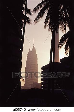 Malaysia, Kuala Lumpur, Petronas Towers at sunset. View Large Photo Image Stock Image - Malaysia, Kuala Lumpur, Petronas Towers at sunset.. Fotosearch