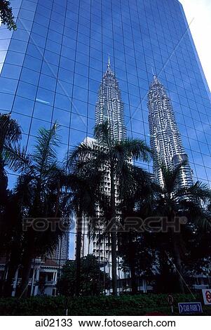 Malaysia, Kuala Lumpur, reflection of Petronas Towers. View Large Photo Image Stock Image - Malaysia, Kuala Lumpur, reflection of Petronas Towers.. Fotosearch