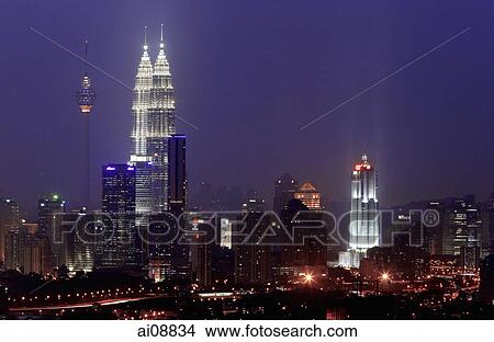 Picture - Malaysia, Kuala Lumpur, skyline at night. Fotosearch