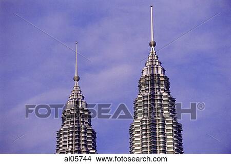 Malaysia, Kuala Lumpur, Twin tops of Petronas Towers. View Large Photo Image Picture - Malaysia, Kuala Lumpur, Twin tops of Petronas Towers.. Fotosearch