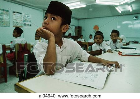 Malaysia, Kuala Lumpur, young Muslim boy in class at the National Mosque. View Large Photo Image Stock Image - Malaysia, Kuala Lumpur, young Muslim boy in class at the National Mosque.. Fotosearch