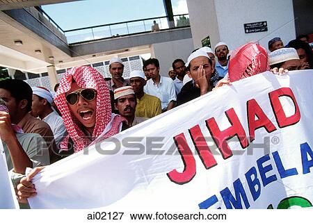 Malaysia, Kuala Lumpur, young Muslims "Jihadis" protest at open-air National Mosque. View Large Photo Image Stock Photo - Malaysia, Kuala Lumpur, young Muslims "Jihadis" protest at open-air National Mosque.. Fotosearch