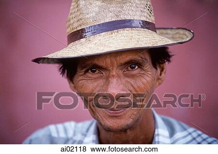 Stock Photo - Malaysia, Malacca, man with hat (close up).. Fotosearch