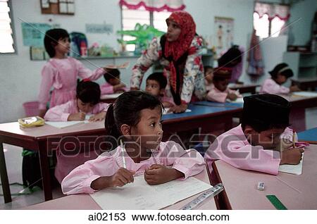 Stock Image - Malaysia, Penang, Georgetown, Students in Islamic School.. Fotosearch