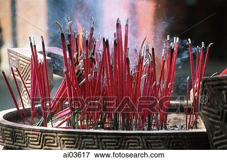 Stock Photo - Malaysia, Penang, Joss sticks in temple urn. Fotosearch