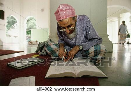 Malaysia, Penang, Muslim scholar studies Islamic histories at Kapitan Kling Mosque. View Large Photo Image Stock Image - Malaysia, Penang, Muslim scholar studies Islamic histories at Kapitan Kling Mosque.. Fotosearch