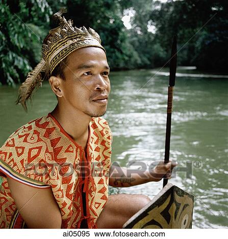 Malaysia, Sarawak, Iban warrior in traditional costume View Large Photo Image Stock Photography - Malaysia, Sarawak, Iban warrior in traditional costume. Fotosearch