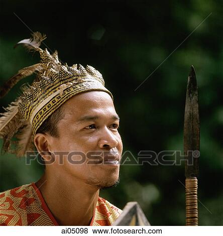 Malaysia, Sarawak, Iban Warrior wearing traditional dress View Large Photo Image Stock Photo - Malaysia, Sarawak, Iban Warrior wearing traditional dress. Fotosearch