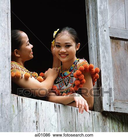 Malaysia, Sarawak, NR Kuching, Santubong, Cultural Village Bidayuh, girls in traditional costume View Large Photo Image Stock Photograph - Malaysia, Sarawak, NR Kuching, Santubong, Cultural Village Bidayuh, girls in traditional costume. Fotosearch