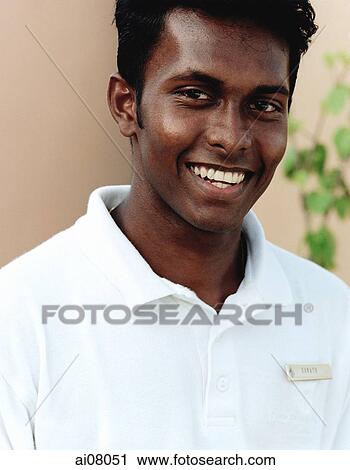 Maldives, Kuda Huraa atoll, Four Seasons Resort, Portrait of Indian Spa attendant. View Large Photo Image Stock Image - Maldives, Kuda Huraa atoll, Four Seasons Resort, Portrait of Indian Spa attendant.. Fotosearch