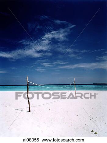 Stock Photography - Maldives, Kunfunadhoo atoll, Soneva Fushi, Volleyball net on Dolphin Beach.. Fotosearch