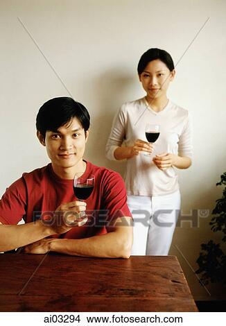 Man and woman with wine glasses, portrait View Large Photo Image Picture - Man and woman with wine glasses, portrait. Fotosearch
