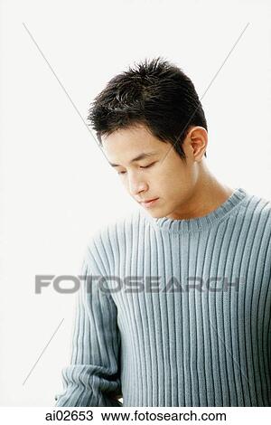 Man in blue sweater, white background View Large Photo Image Stock Image - Man in blue sweater, white background. Fotosearch