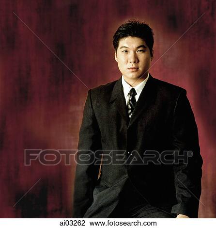 Stock Image - Man in suit, portrait. Fotosearch