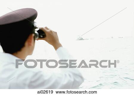 Man in white with binoculars, looking out to sea View Large Photo Image Stock Photo - Man in white with binoculars, looking out to sea. Fotosearch