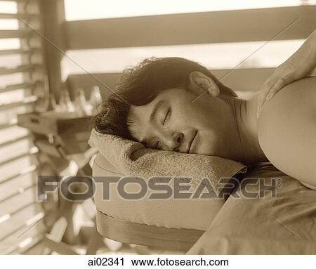 Man on table getting massage View Large Photo Image Stock Image - Man on table getting massage. Fotosearch