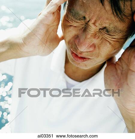 Man rubbing temples. View Large Photo Image Stock Image - Man rubbing temples.. Fotosearch