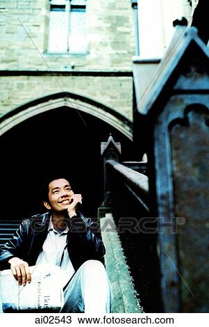Man sitting on stairs with head on hand View Large Photo Image Stock Image - Man sitting on stairs with head on hand. Fotosearch
