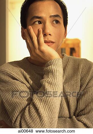 Man with thoughtful expression, resting head on hand View Large Photo Image Stock Photo - Man with thoughtful expression, resting head on hand. Fotosearch
