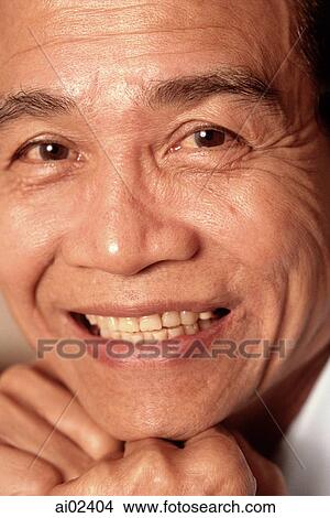 Mature man smiling, portrait View Large Photo Image Picture - Mature man smiling, portrait. Fotosearch