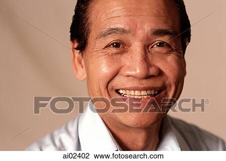 Mature man smiling, portrait View Large Photo Image Stock Image - Mature man smiling, portrait. Fotosearch