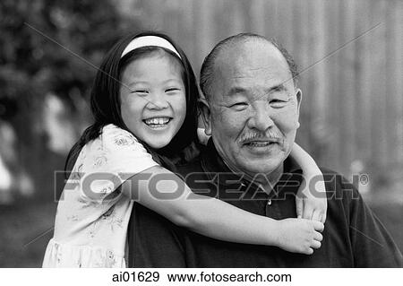 Mature man with little girl, portrait View Large Photo Image Stock Photo - Mature man with little girl, portrait. Fotosearch