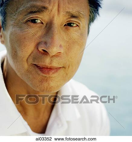 Mature man with sea in background, portrait View Large Photo Image Stock Image - Mature man with sea in background, portrait. Fotosearch