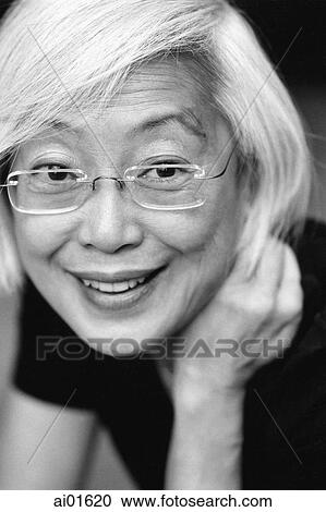 Mature woman with glasses, portrait View Large Photo Image Stock Image - Mature woman with glasses, portrait. Fotosearch