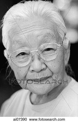 Mature woman with glasses, portrait View Large Photo Image Stock Image - Mature woman with glasses, portrait. Fotosearch