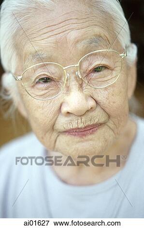 Mature woman with glasses, portrait View Large Photo Image Stock Photo - Mature woman with glasses, portrait. Fotosearch