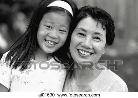 Mature woman with little girl, portrait View Large Photo Image Stock Image - Mature woman with little girl, portrait. Fotosearch