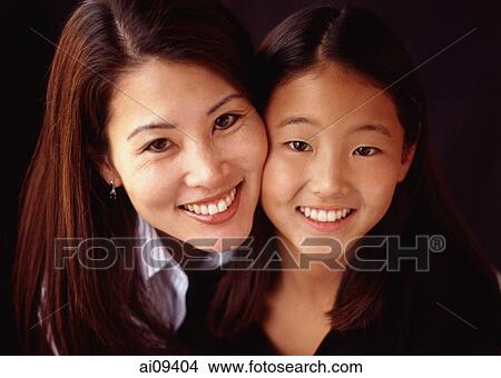 Mother and daughter, smiling, portrait View Large Photo Image Picture - Mother and daughter, smiling, portrait. Fotosearch